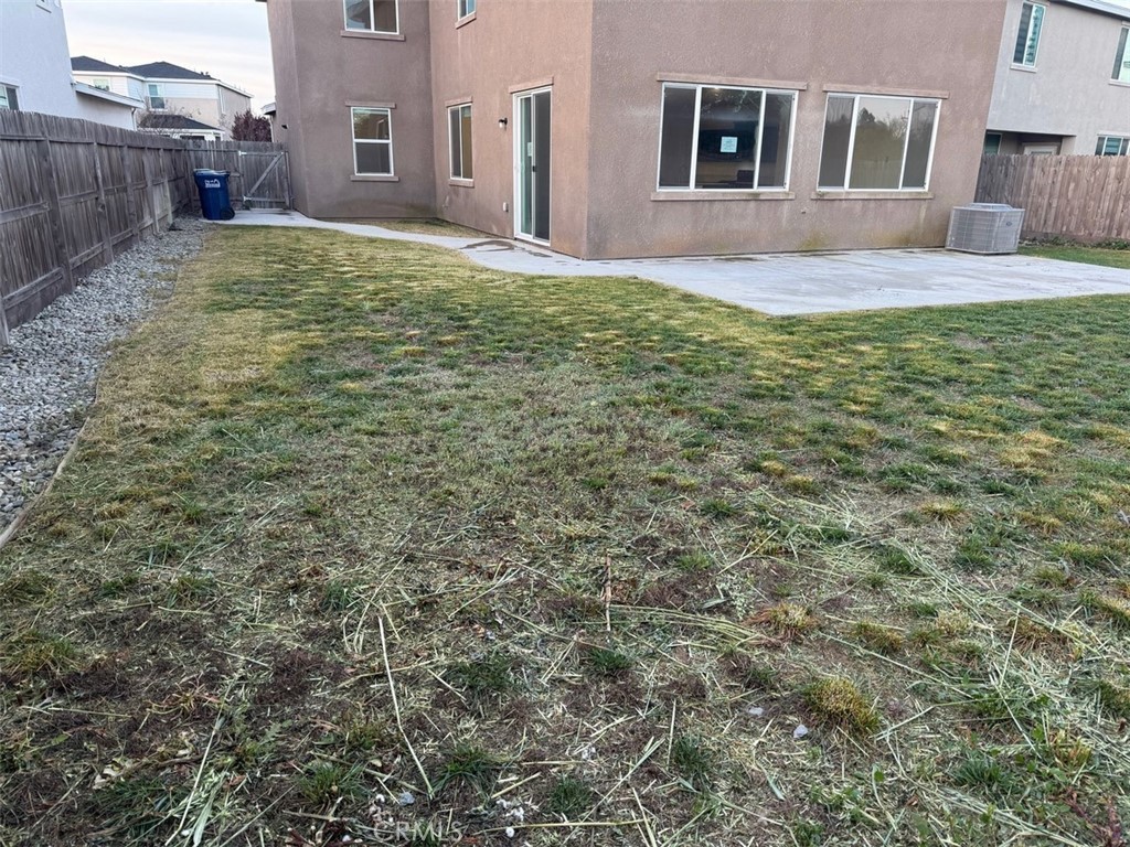 2415 Explorador Drive Merced, CA 95340 - Photo 5 of 28 a view of a house with a yard