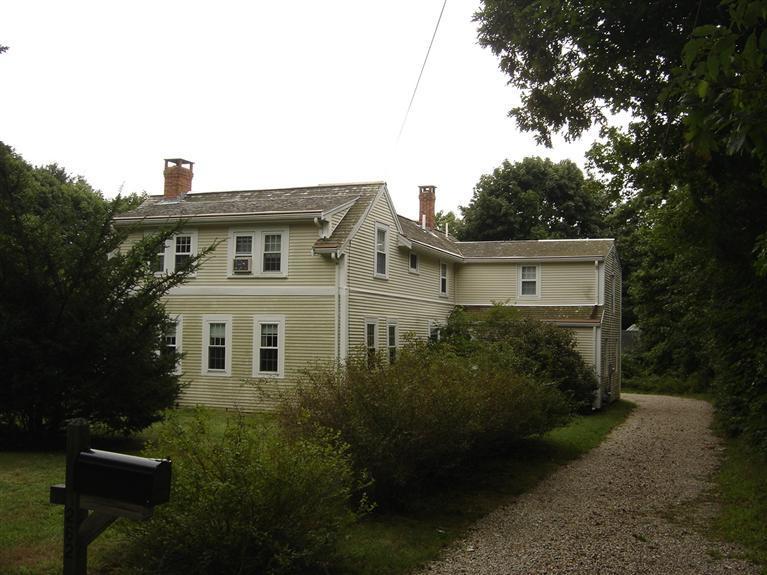 262 Fuller Road Centerville, MA 02632 - Photo 2 of 17 a view of a house with a backyard