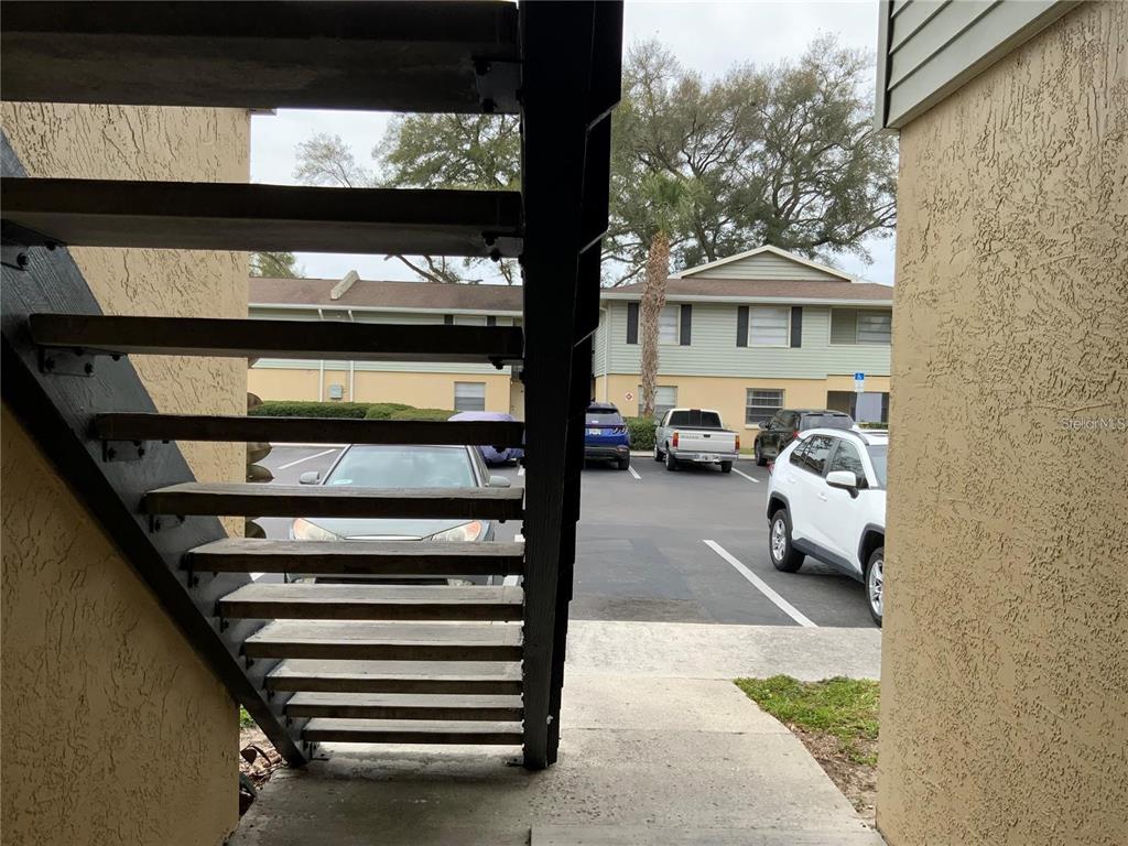 233 Red Maple Place, Unit 233 Brandon, FL 33510 - Photo 15 of 16 a view of a car park in front of building