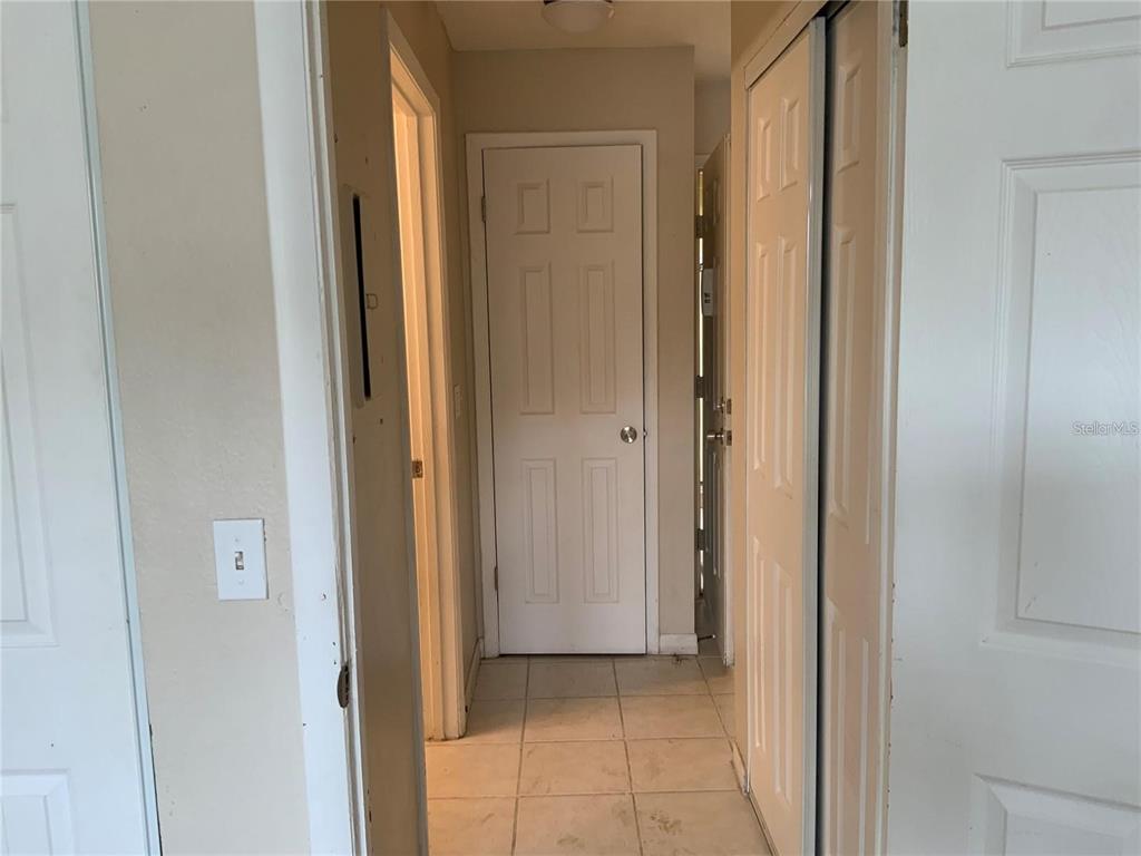 233 Red Maple Place, Unit 233 Brandon, FL 33510 - Photo 10 of 16 a view of a bathroom with a glass door