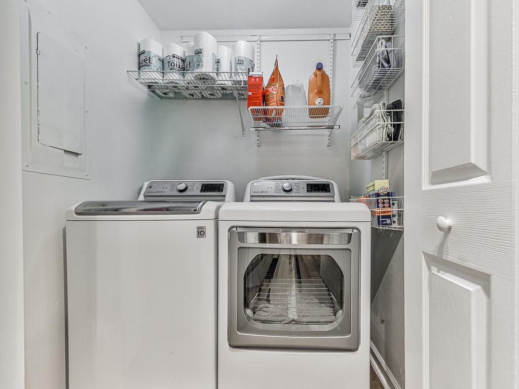 1708 Brighton Point Atlanta, GA 30328 - Photo 13 of 31 a utility room with dryer and washer