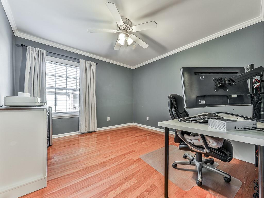 1708 Brighton Point Atlanta, GA 30328 - Photo 14 of 31 a workspace with furniture and window