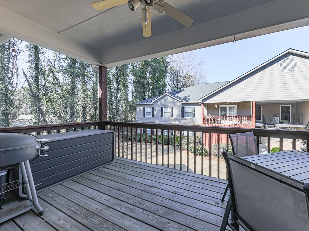 1708 Brighton Point Atlanta, GA 30328 - Photo 23 of 31 a view of balcony with wooden floor and furniture