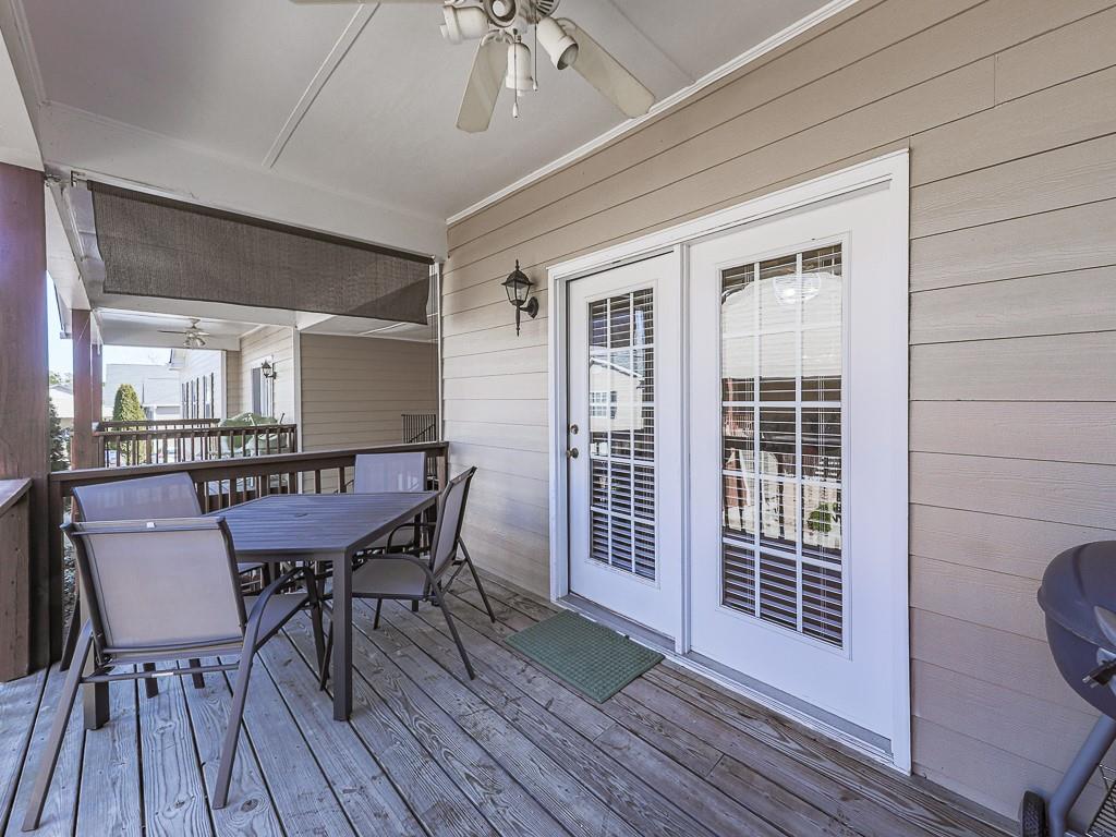 1708 Brighton Point Atlanta, GA 30328 - Photo 24 of 31 a view of a dining room with furniture window and wooden floor