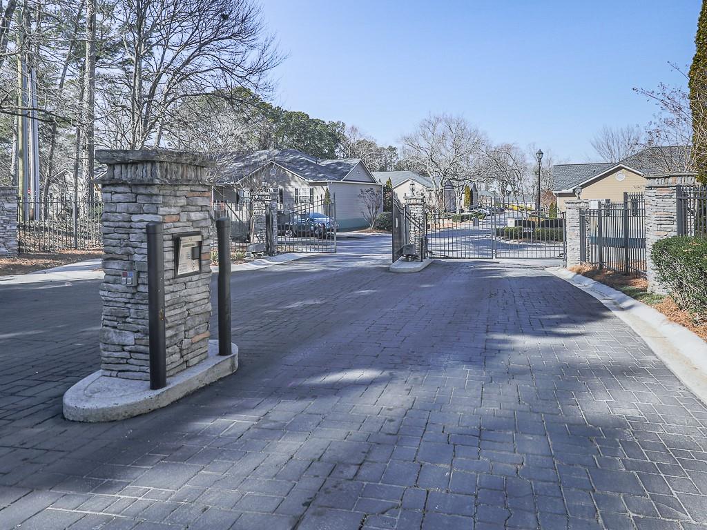 1708 Brighton Point Atlanta, GA 30328 - Photo 31 of 31 a view of a city street lined with buildings