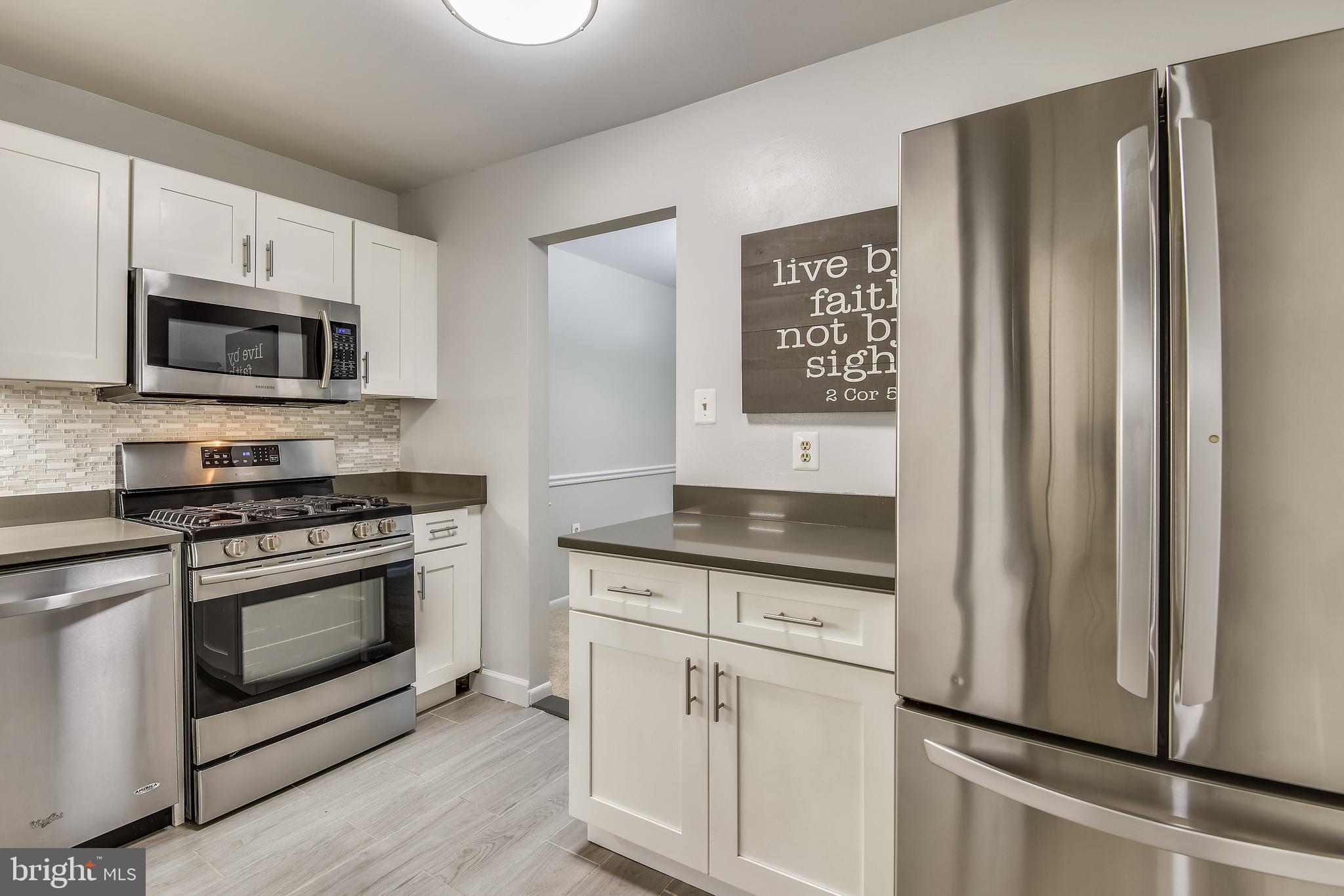 1435 Northgate Square, Unit 22B Reston, VA 20190 - Photo 4 of 49 Kitchen with updated tiles
