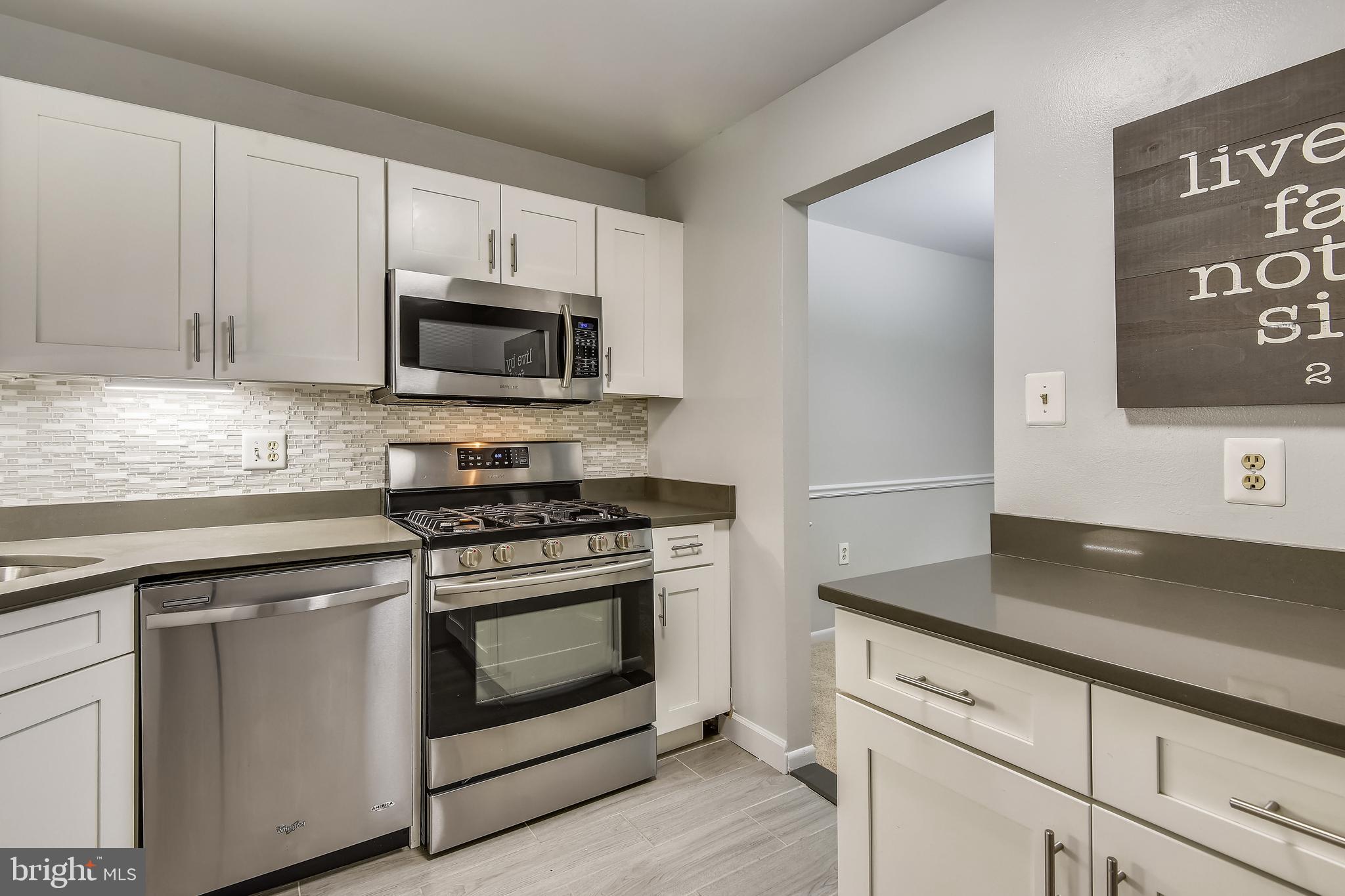 1435 Northgate Square, Unit 22B Reston, VA 20190 - Photo 5 of 49 Kitchen with updated cabinetry