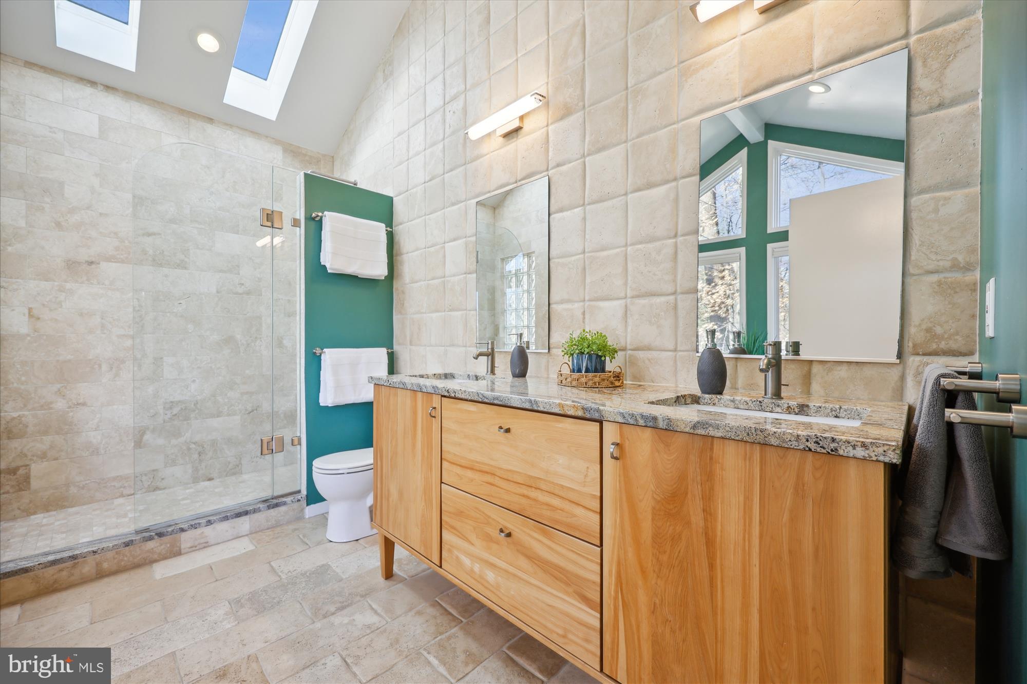 8328 Fenway Road Bethesda, MD 20817 - Photo 22 of 62 Primary Bathroom with a Gabled Ceiling