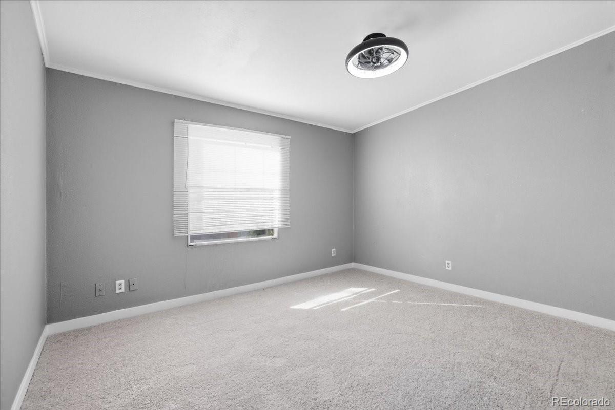 218 Grape Street Hudson, CO 80642 - Photo 17 of 22 a view of a room with rack on the wall