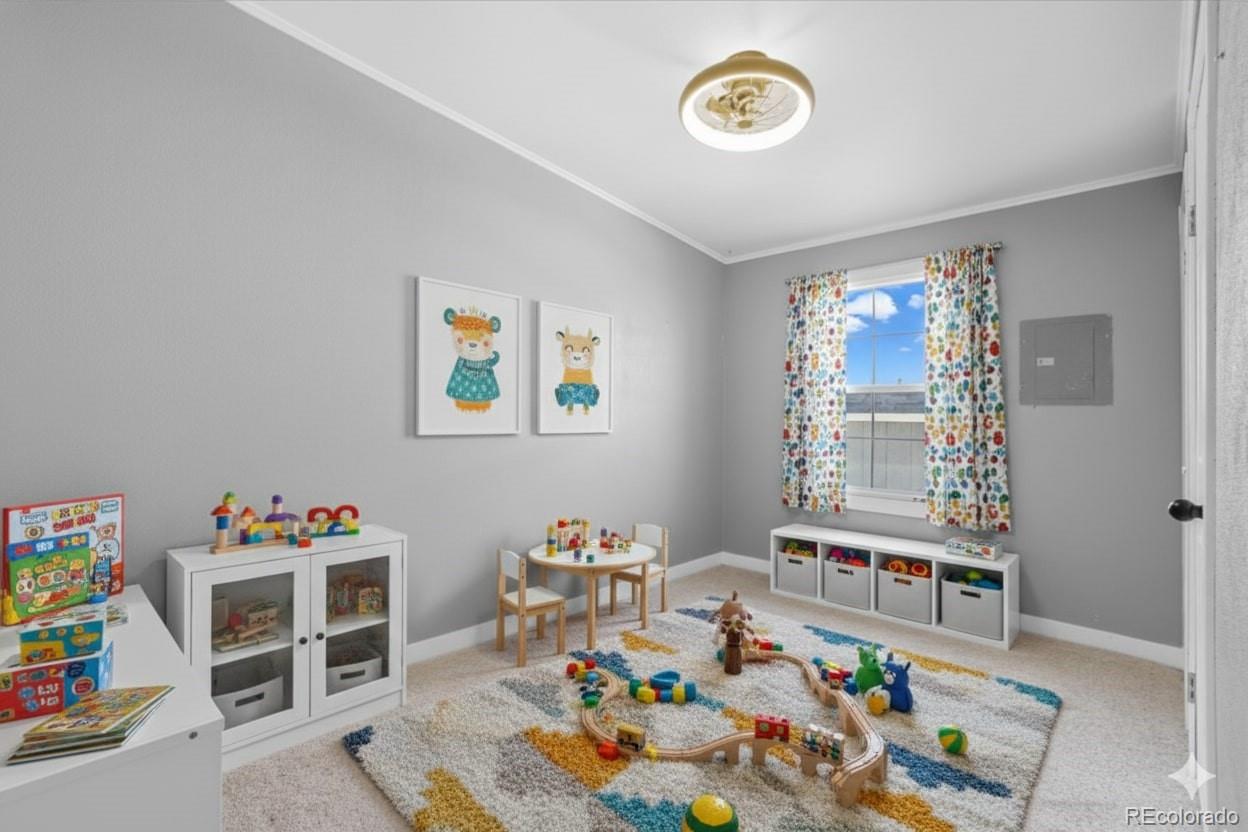 218 Grape Street Hudson, CO 80642 - Photo 20 of 22 a very nice looking room with a big bed and a window