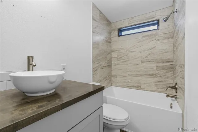 a view of a bathtub in a bathroom