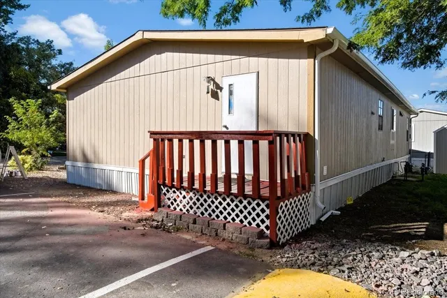 a view of a backyard with a swing