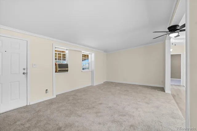 an empty room with windows