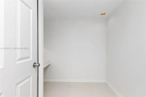 a view of a room with rack on the wall