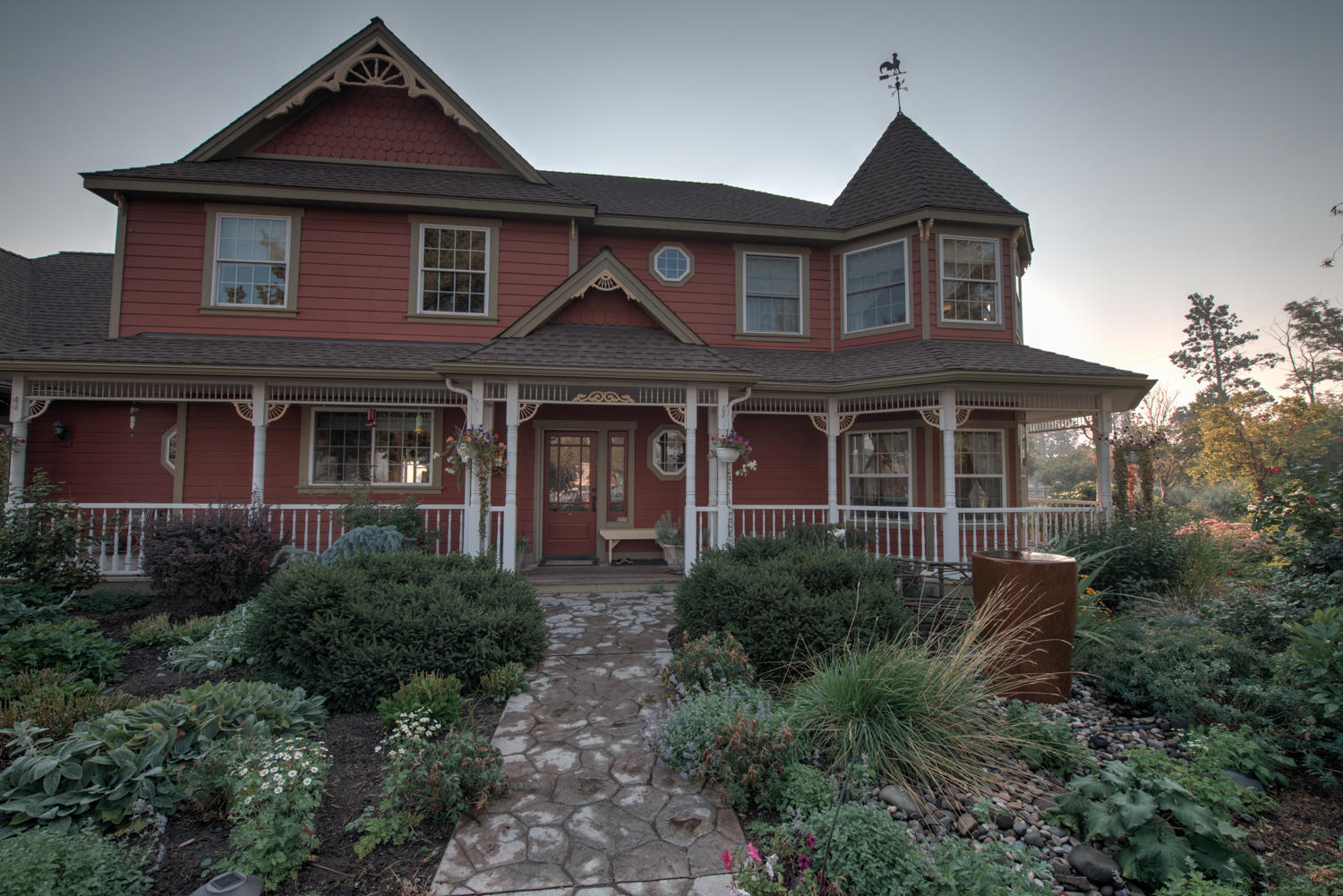 22222 Erickson Road Bend, OR 97701 - Photo 2 of 100 a front view of a house with garden