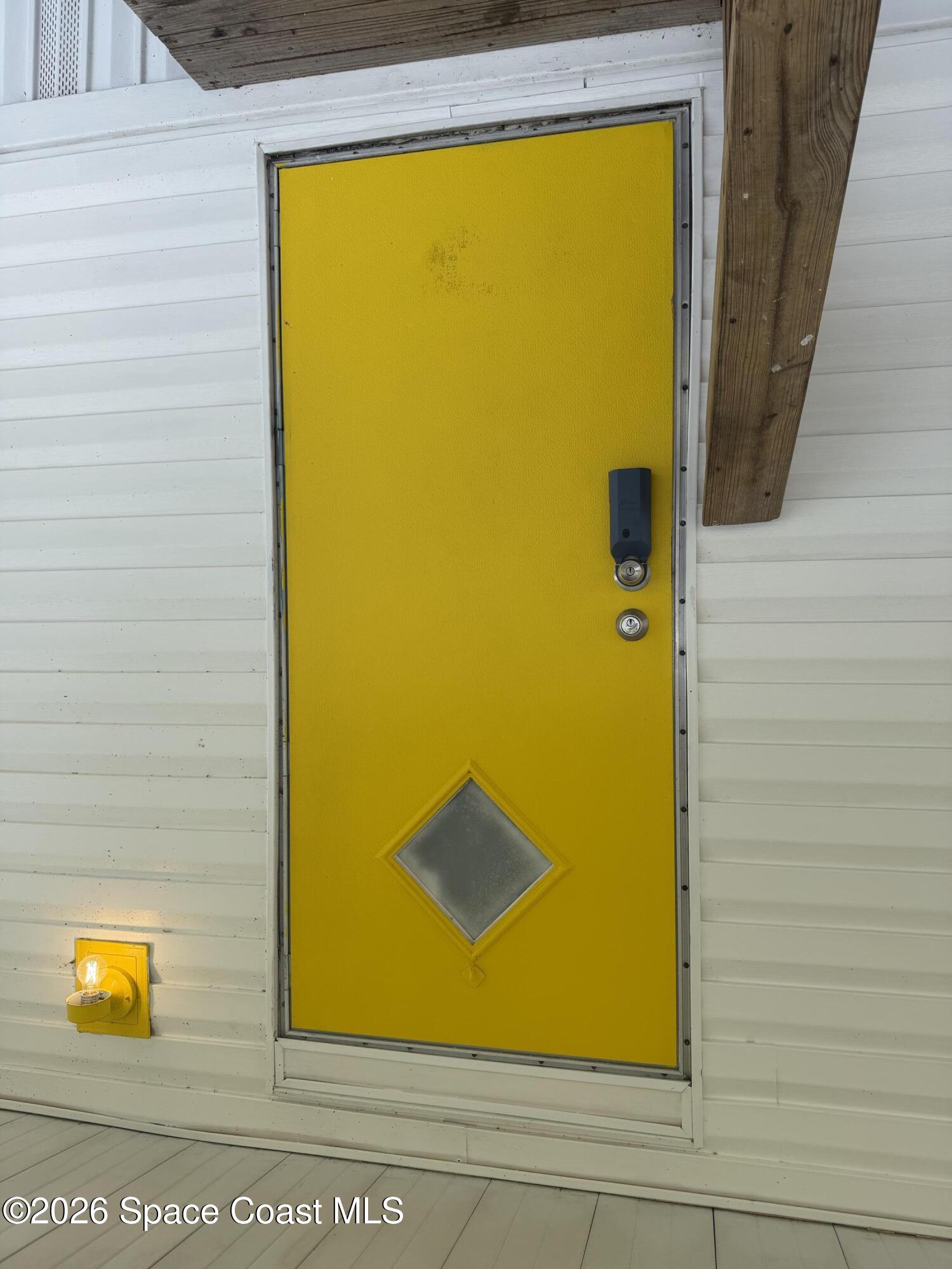 2132 Rocway Drive Melbourne, FL 32935 - Photo 2 of 16 a view of a door with an outdoor space