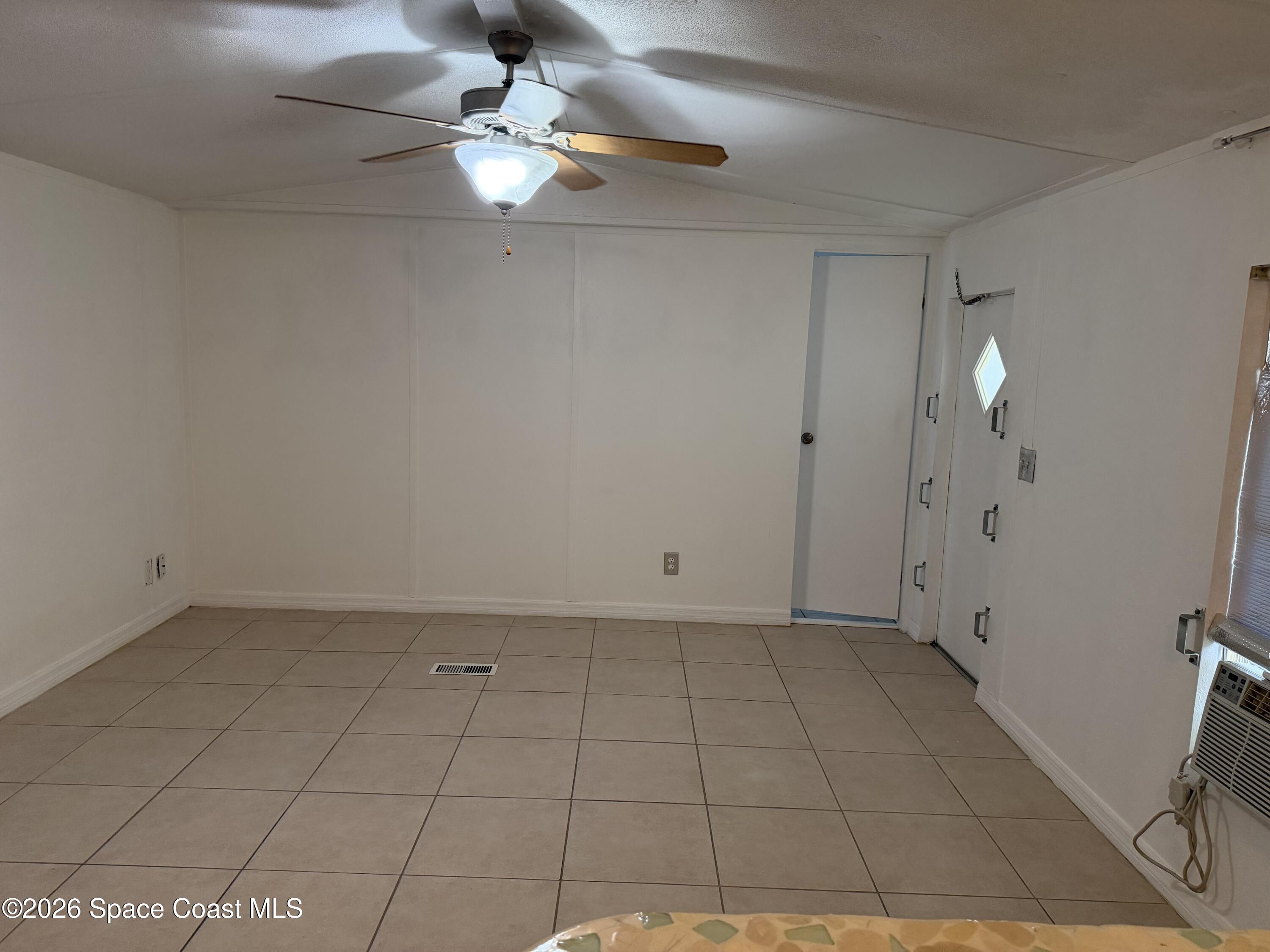 2132 Rocway Drive Melbourne, FL 32935 - Photo 4 of 16 a view of an empty room