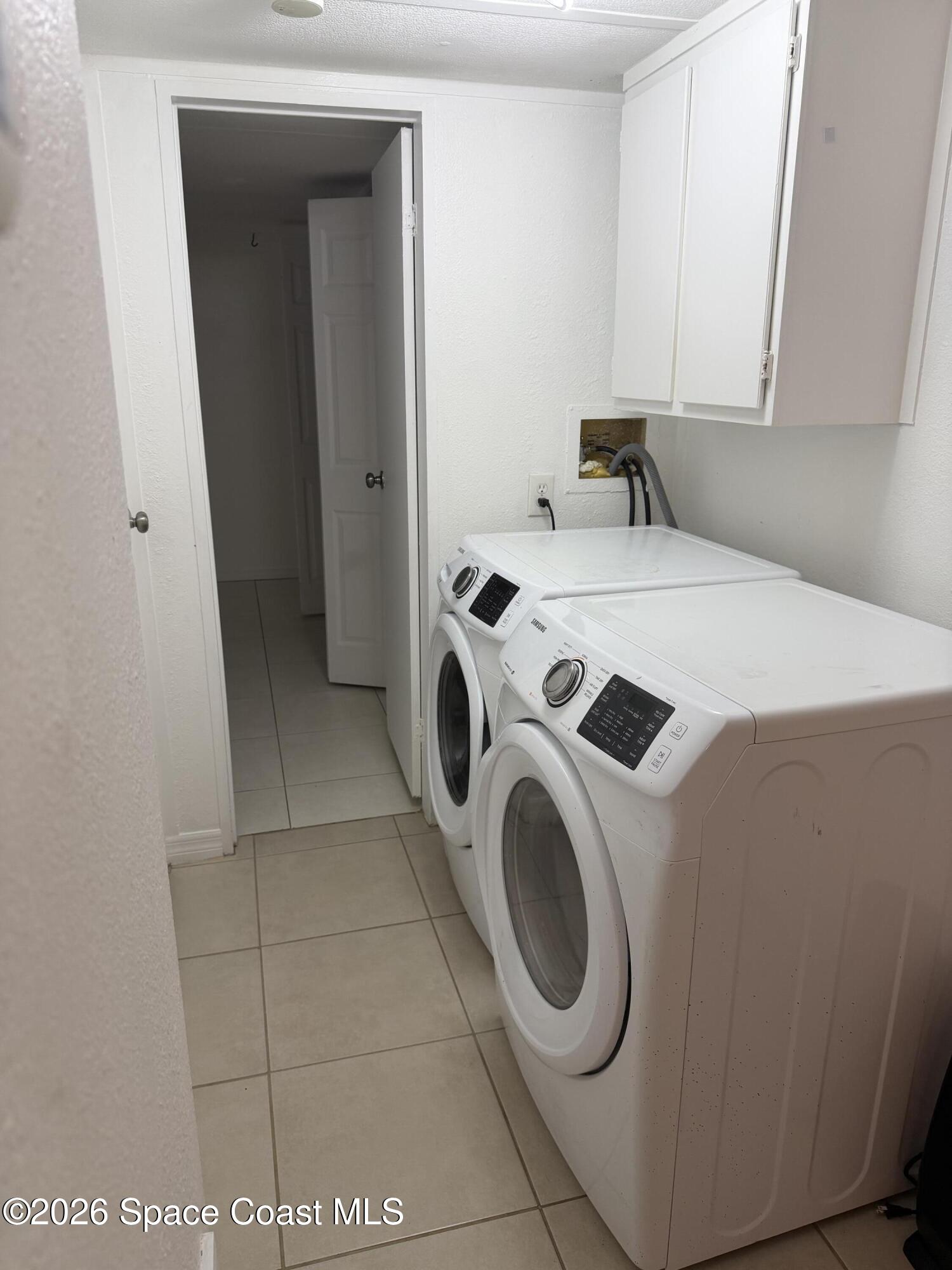 2132 Rocway Drive Melbourne, FL 32935 - Photo 10 of 16 a utility room with dryer and washer