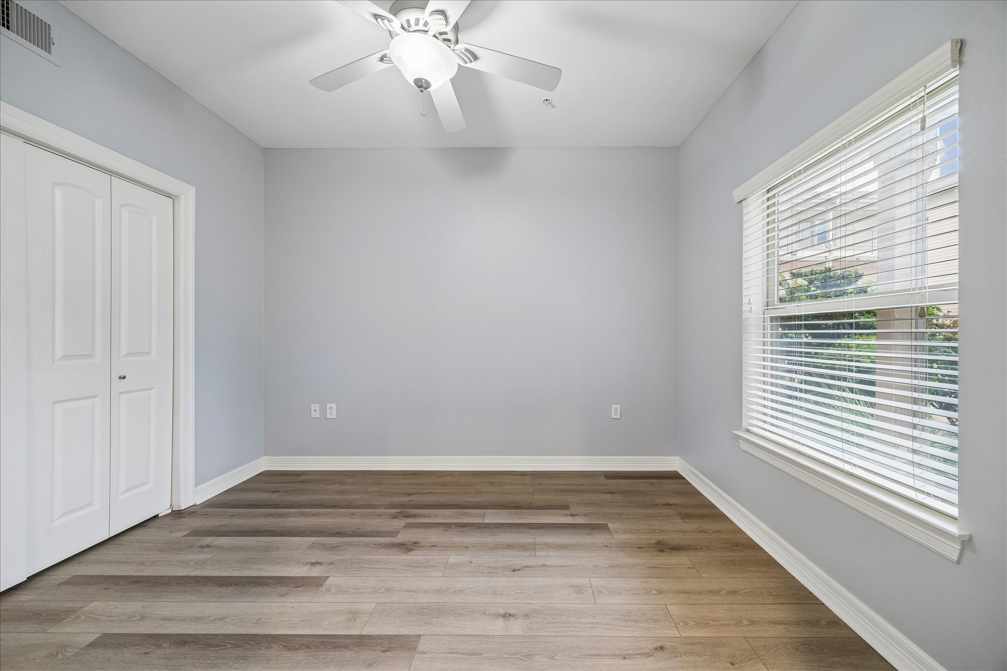 3501 Chenevert Street, Unit 7 Houston, TX 77004 - Photo 14 of 21 updated engineered hardware floors in all bedrooms and living spaces.