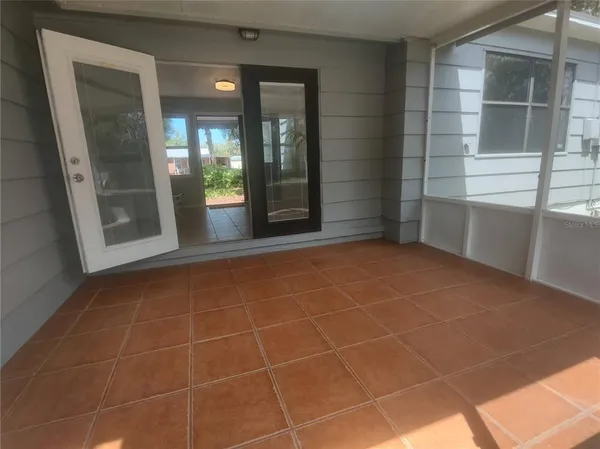a view of a room with windows