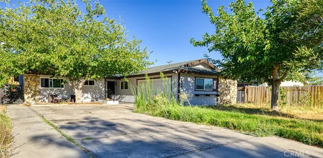 a house with trees in front of it