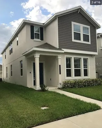 a view of a house with backyard
