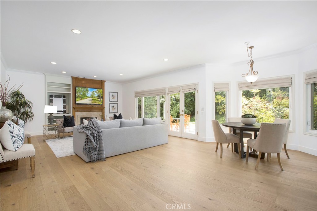 11376 Loch Lomond Road Los Alamitos, CA 90720 - Photo 11 of 32 a living room with furniture and a large window