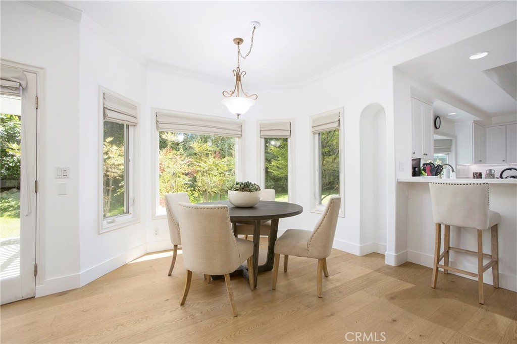 11376 Loch Lomond Road Los Alamitos, CA 90720 - Photo 15 of 32 a view of a dining room with furniture window and outside view