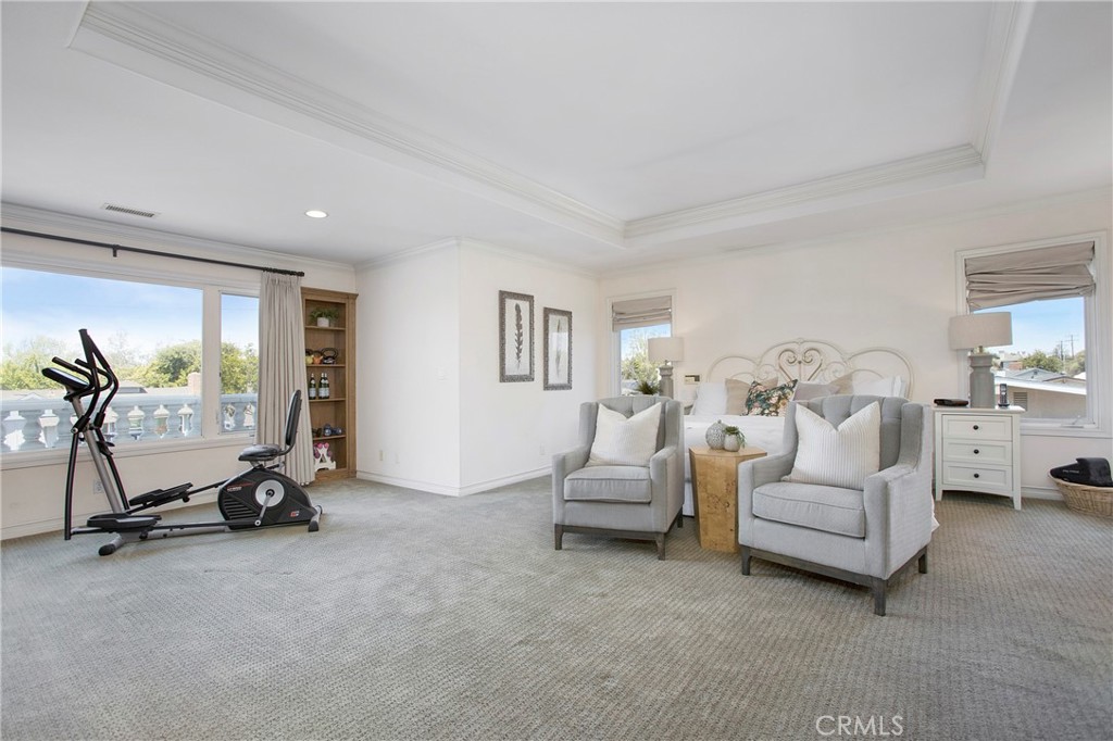 11376 Loch Lomond Road Los Alamitos, CA 90720 - Photo 16 of 32 a living room with furniture gym equipment and a view of living room