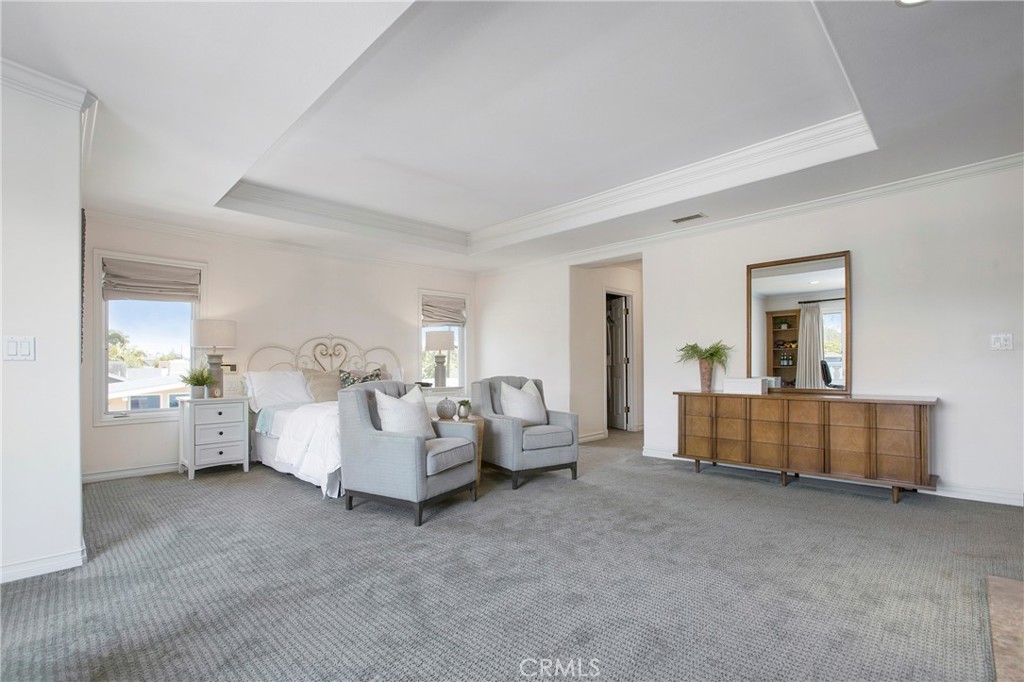 11376 Loch Lomond Road Los Alamitos, CA 90720 - Photo 17 of 32 a living room with furniture and a wooden floor