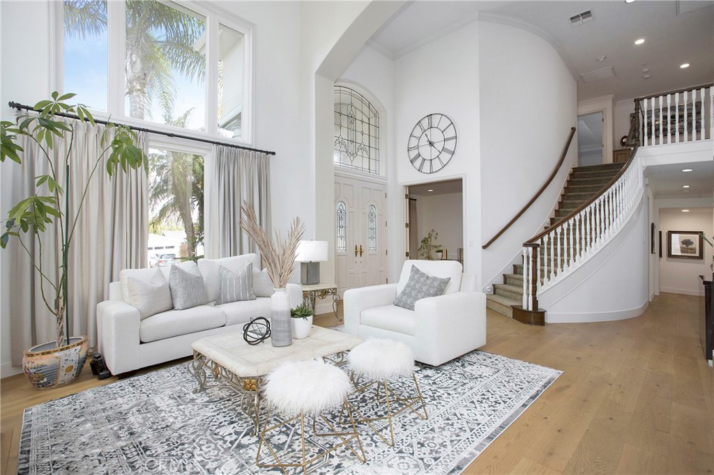 11376 Loch Lomond Road Los Alamitos, CA 90720 - Photo 2 of 32 a living room with furniture and a table