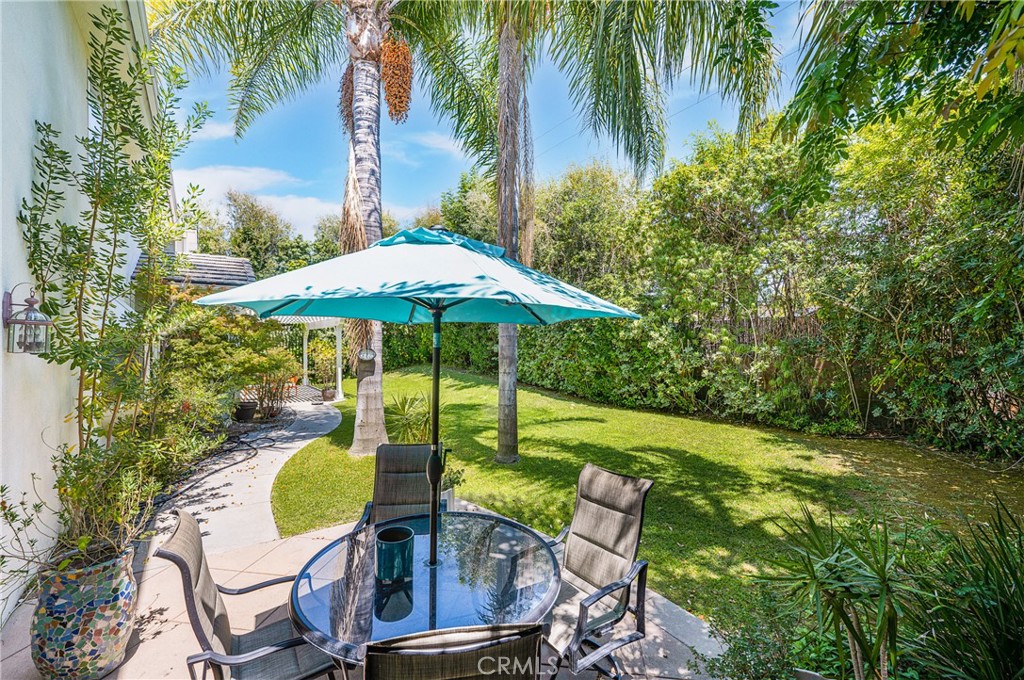 11376 Loch Lomond Road Los Alamitos, CA 90720 - Photo 27 of 32 a view of a swimming pool and lounge chairs