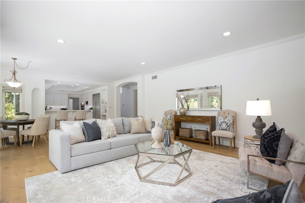 11376 Loch Lomond Road Los Alamitos, CA 90720 - Photo 9 of 32 a living room with furniture and a wooden floor