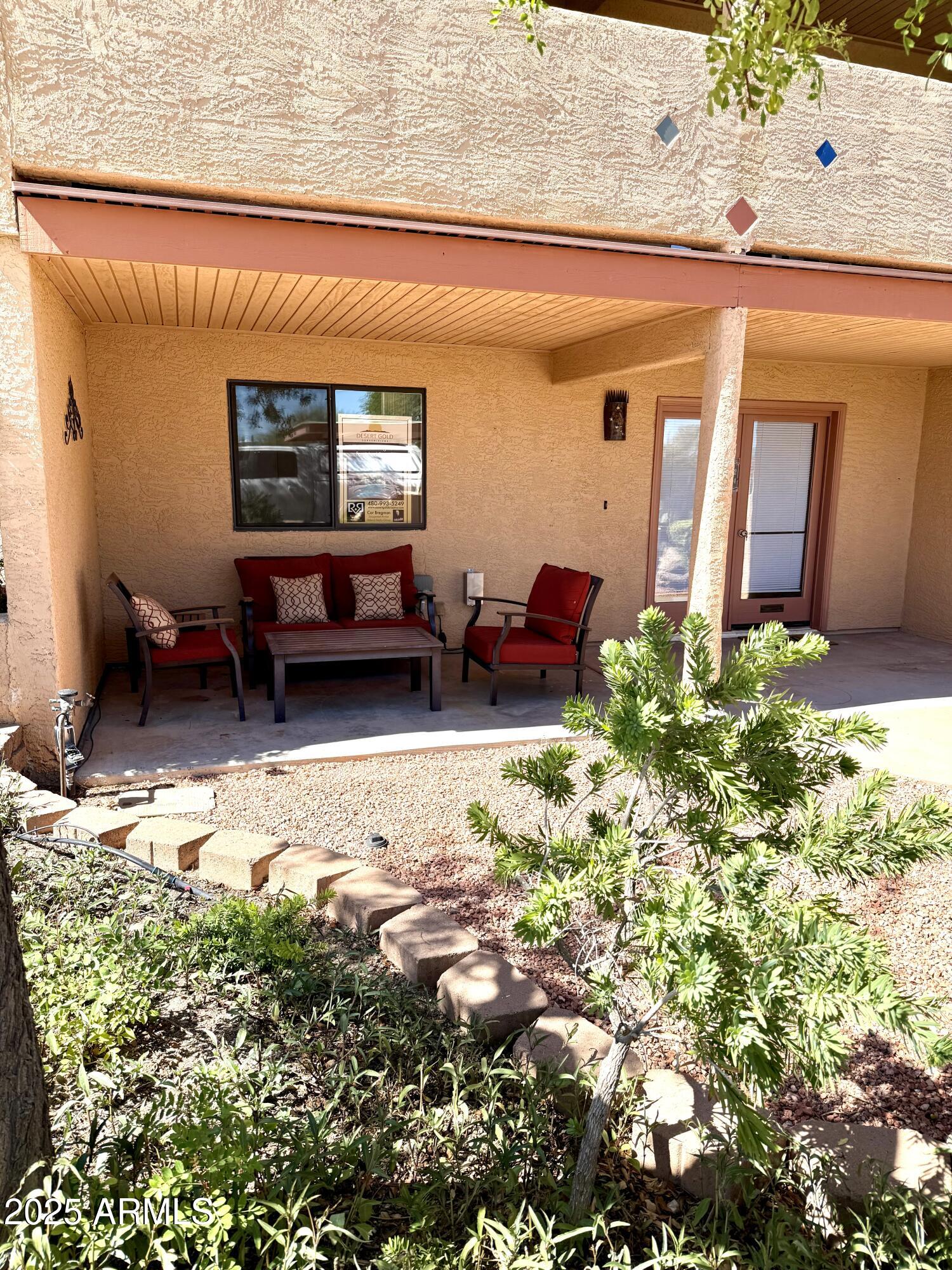 540 South West Road, Unit 24 Wickenburg, AZ 85390 - Photo 16 of 23 a view of a house with a yard