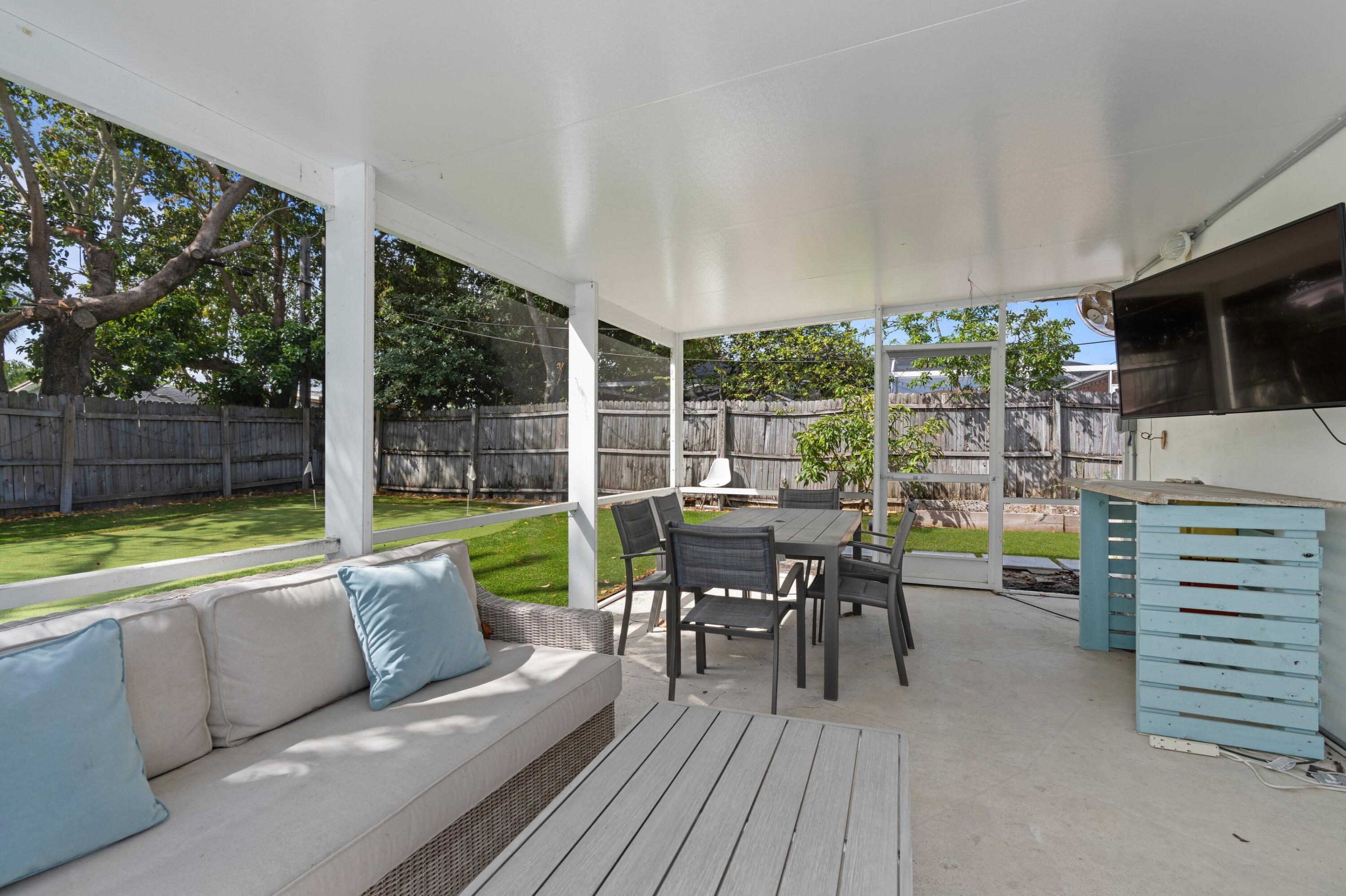226 Southwest 13th Avenue Boynton Beach, FL 33435 - Photo 14 of 16 a view of a patio with swimming pool