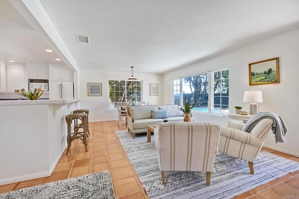 3897 Park Drive Carlsbad, CA 92008 - Photo 13 of 39 a living room with furniture windows and a table