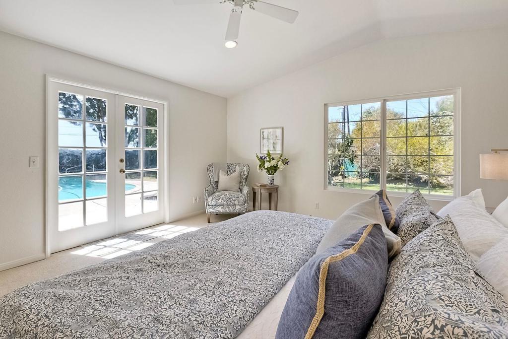 3897 Park Drive Carlsbad, CA 92008 - Photo 23 of 39 a living room with a bed furniture and next to a window