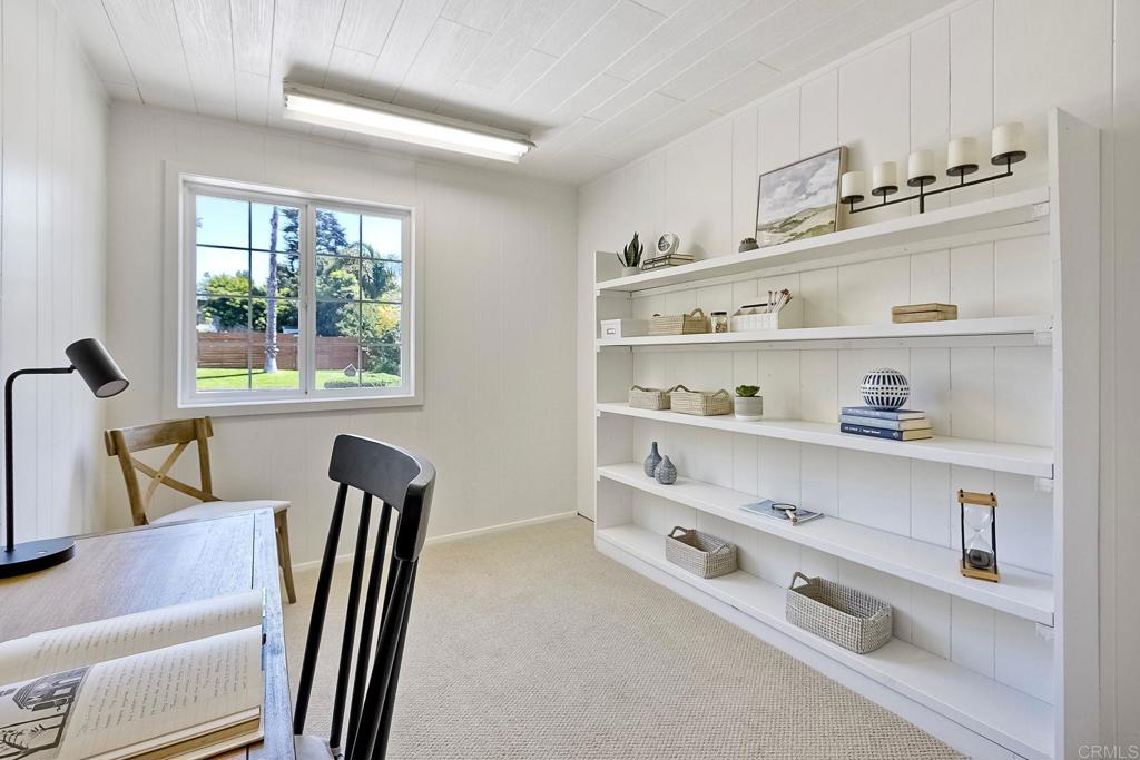 3897 Park Drive Carlsbad, CA 92008 - Photo 26 of 39 a view of dining room with furniture and a window