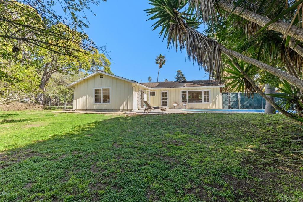 3897 Park Drive Carlsbad, CA 92008 - Photo 33 of 39 a view of a house with a yard