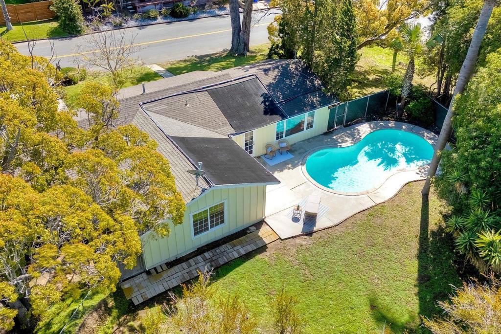 3897 Park Drive Carlsbad, CA 92008 - Photo 38 of 39 a view of a swimming pool with a yard
