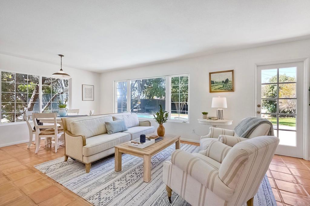 3897 Park Drive Carlsbad, CA 92008 - Photo 9 of 39 a living room with furniture and large windows