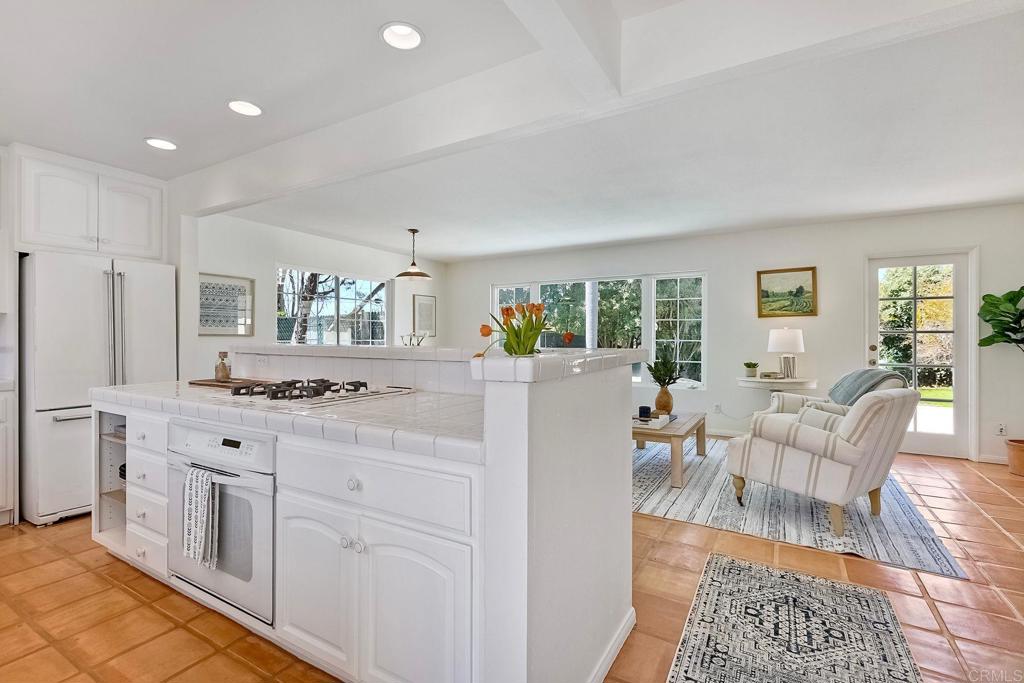 3897 Park Drive Carlsbad, CA 92008 - Photo 10 of 39 a kitchen with white cabinets and sink