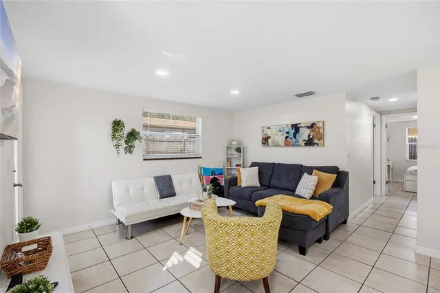 a living room with furniture and a couch