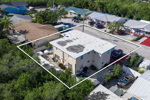 a view of a street with a building in the background