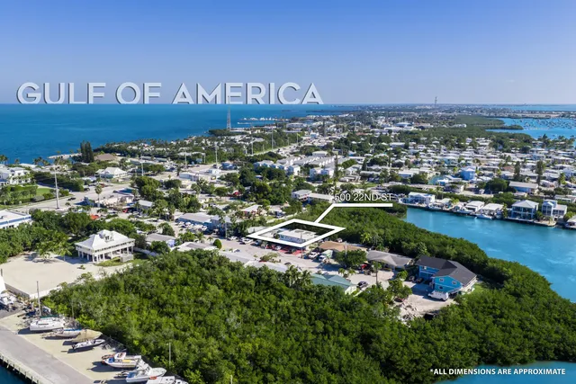 a view of a roof deck with wooden floor and fence