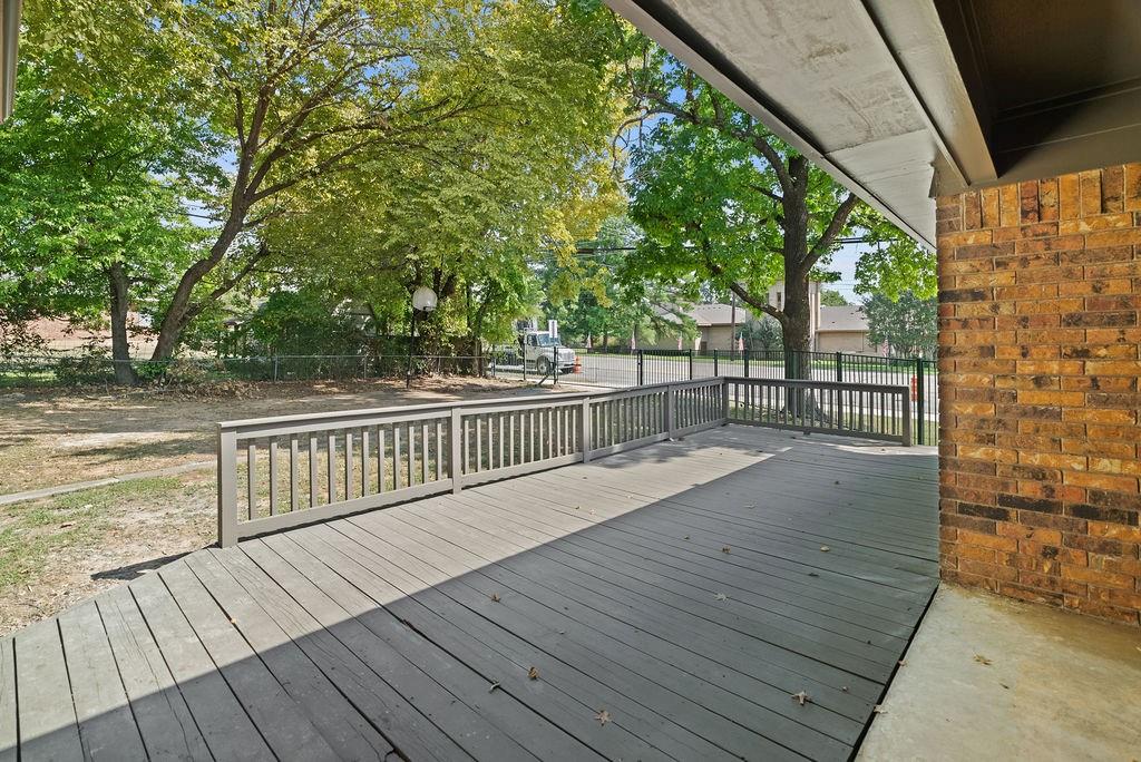1195 33rd Street Southeast Paris, TX 75460 - Photo 17 of 34 a view of balcony with wooden floor