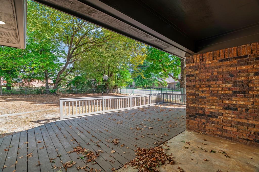 1195 33rd Street Southeast Paris, TX 75460 - Photo 18 of 34 a view of porch with wooden floor