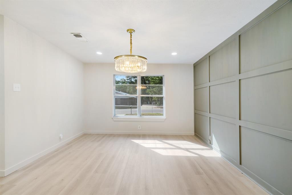 1195 33rd Street Southeast Paris, TX 75460 - Photo 6 of 34 a view of an empty room with a window