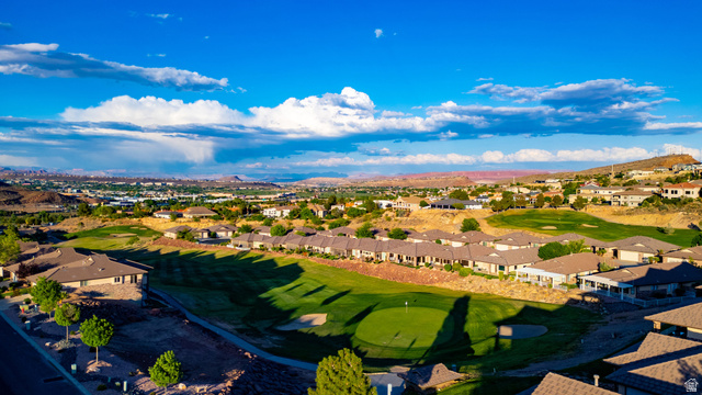 2212 Chippenham Court St. George, UT 84770 - Photo 68 of 75 Aerial view of residential area featuring a golf club and a mountain backdrop