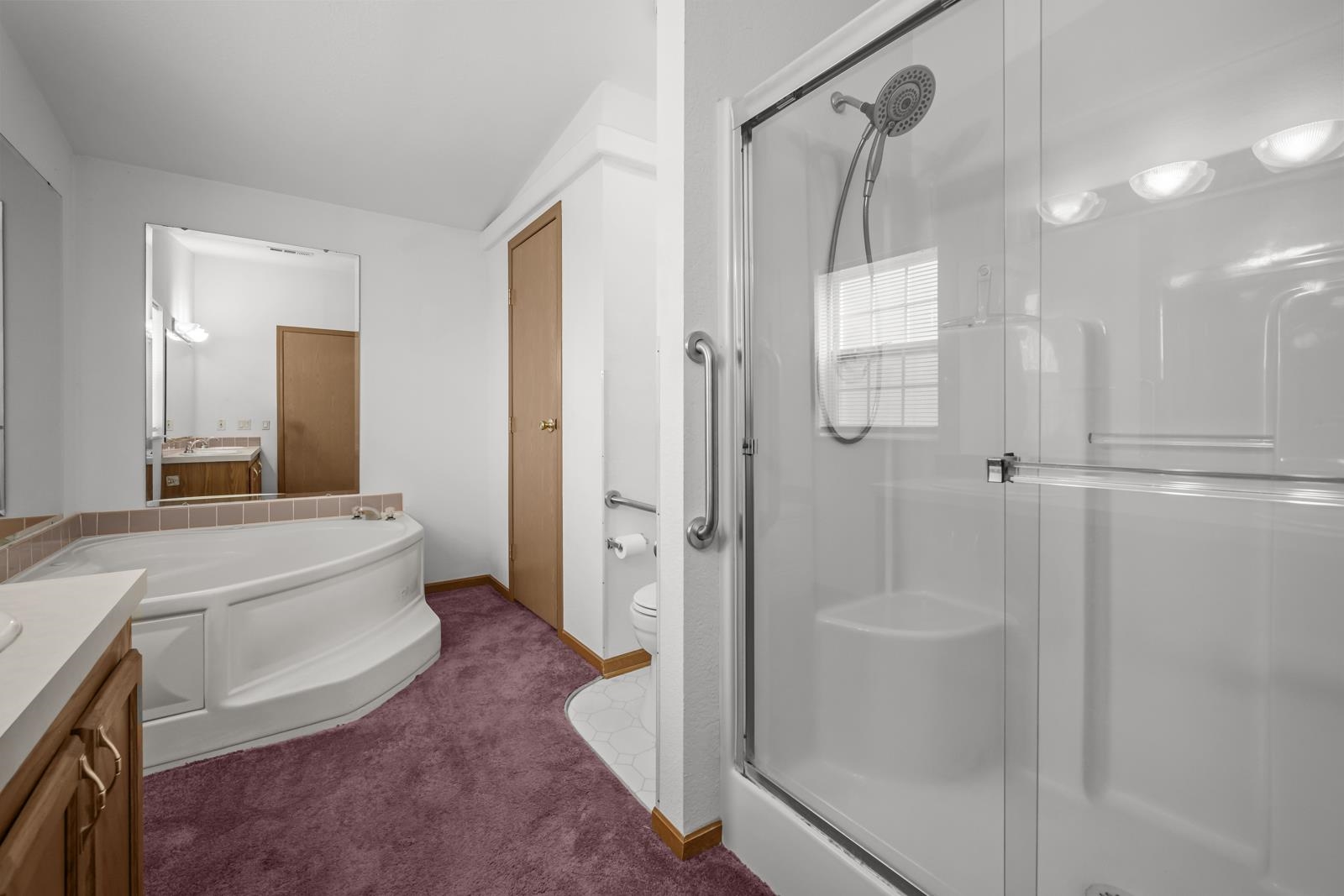 305 Palmetto Bluff Road Palatka, FL 32177 - Photo 16 of 34 a bathroom with a granite countertop sink a mirror a shower and a mirror